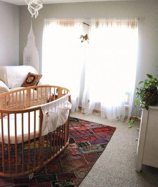 实木圆形婴儿床图片