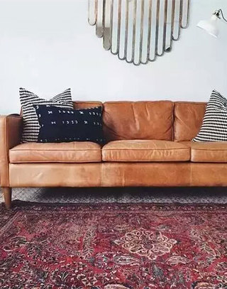 温馨棕色皮质沙发效果图