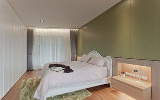 简洁森系卧室 抹绿色背景墙设计