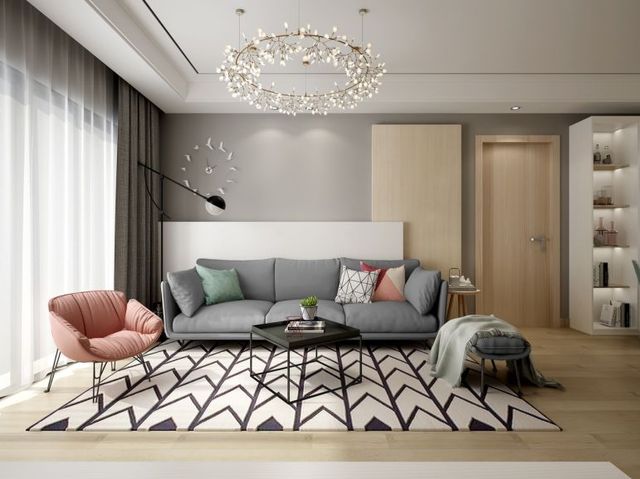 原木色地板,灰白相间的沙发地毯搭配,还有清新粉绿家品点缀,北欧风