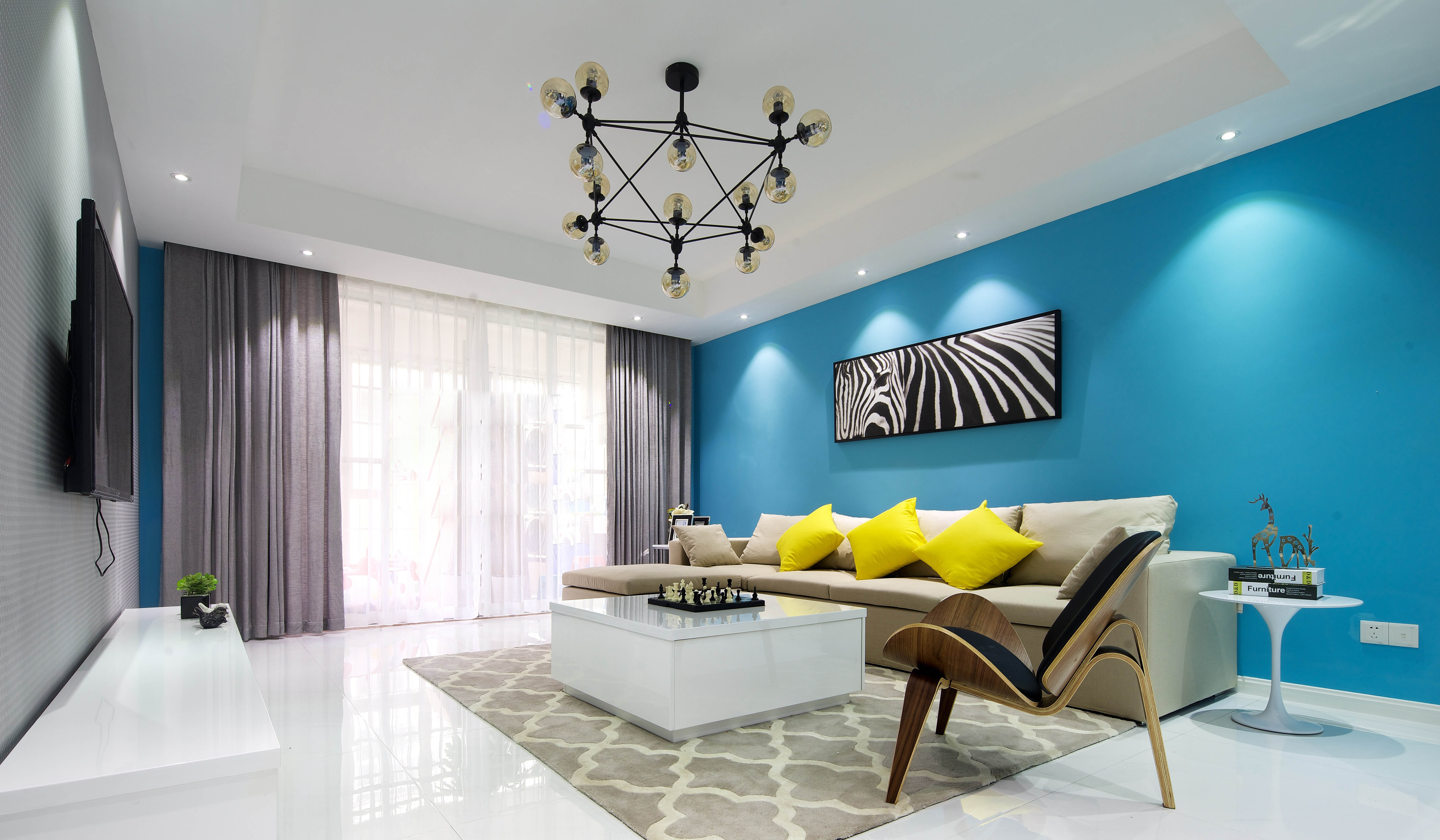 现代简约风蓝色沙发背景墙装修效果图